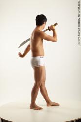 Underwear Fighting with sword Man Asian Average Medium Black Academic